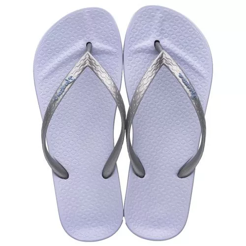 The Brazil style gets a touch-up in this collection; the Anatomic Brazil comes with a cupped heel and shaping around the toes for extra comfort, and a metallic Brazil flag motif for extra luxury in the look! Still a basic, always a classic! Here in a soft lilac purple. Made in Brazil Comfortable to wear Generally true to size - if unsure, go up a size Made with Flexpand, which is 100% recyclable and vegan-friendly Features the unique Ipanema beach sidewalk pattern Anatomic footbed.